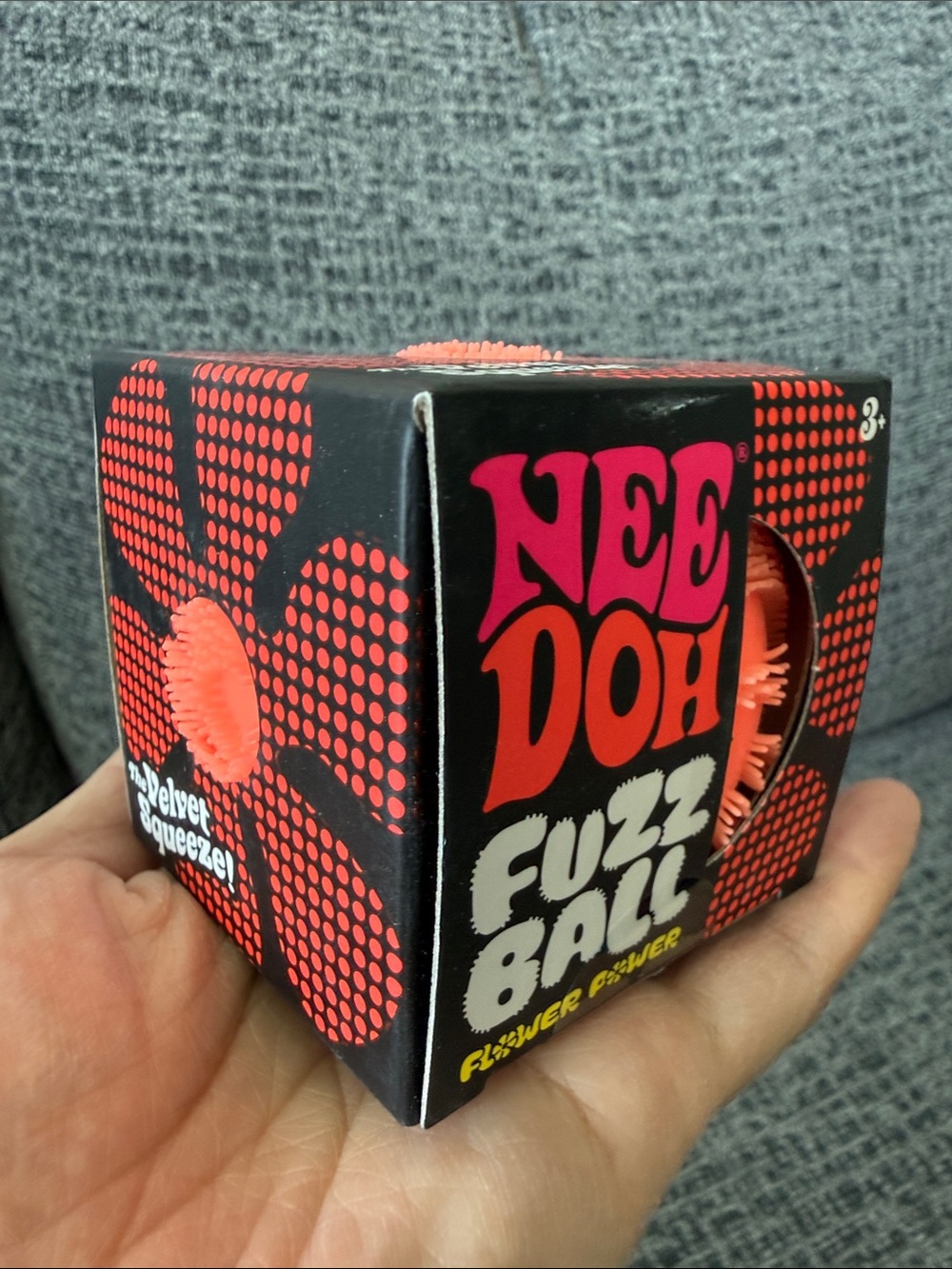 BNIB NeeDoh Fuzz Ball Flower Power, Orange